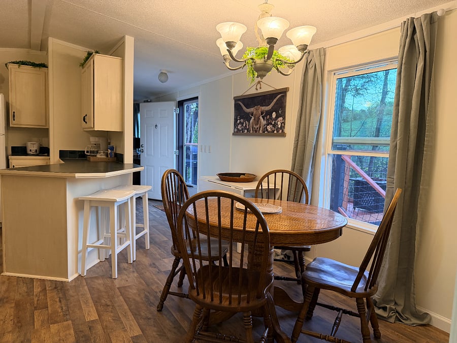 Dining room and part of the kitchen.