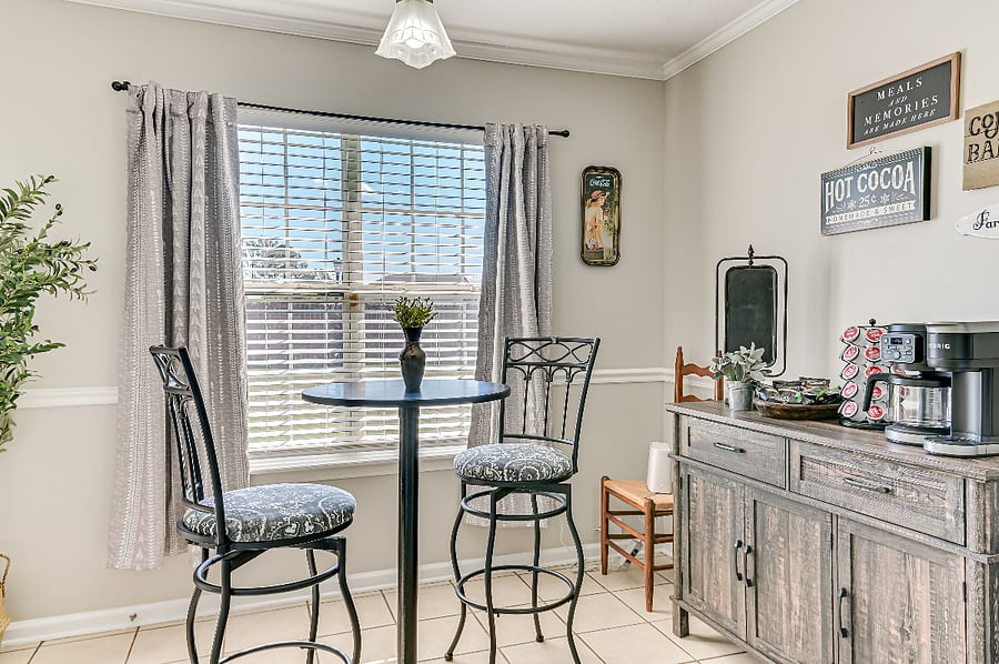 Breakfast dining with high table top, high chairs, coffee bar station with amenities to enjoy an easy beautiful scenic morning.