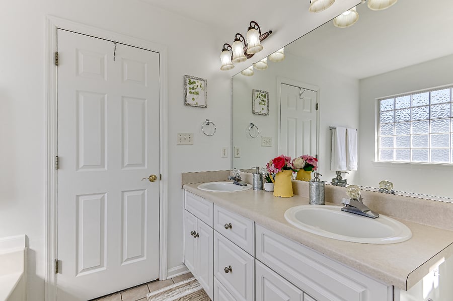 Master bathroom with shower, and tub.