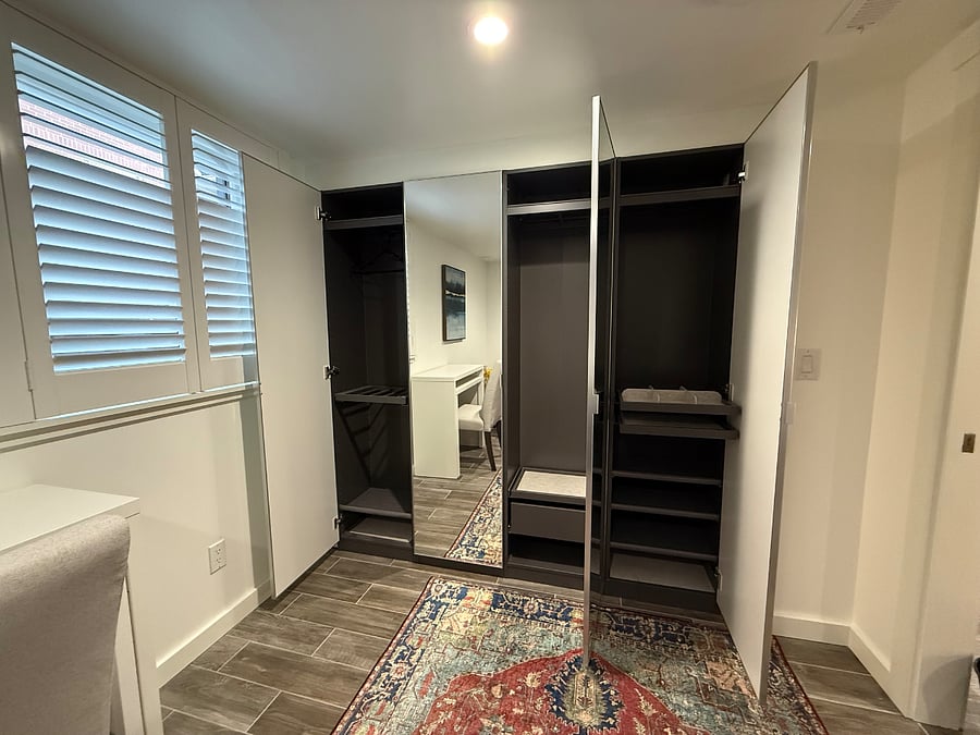 Closet with built-in organizers in the second bedroom