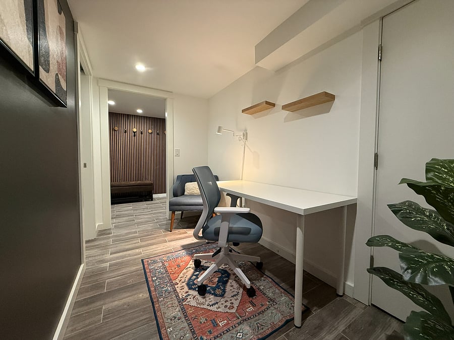 Dedicated Office Space and Reading Nook with 55" Desk and 2 shelves.