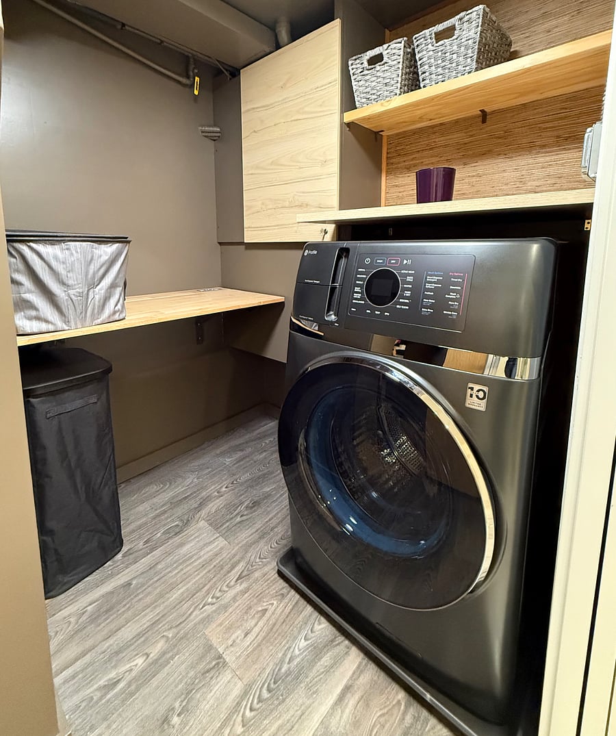 Laundry room including an all-in-One Washer/Dryer Combo. No Transfers Needed.