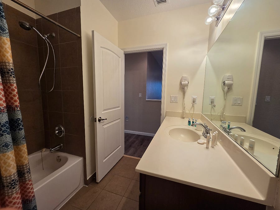 Shared bathroom for 3 rooms with bathtub