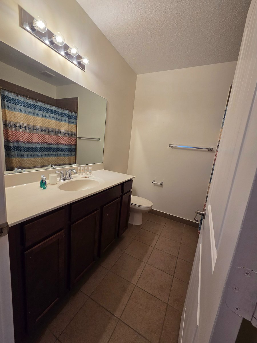 Shared bathroom for 3 rooms with bathtub