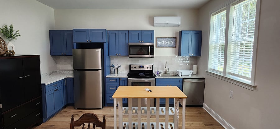 Kitchen features plenty of storage and counter space.