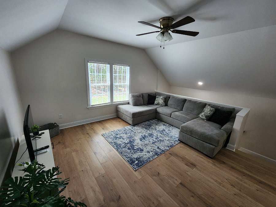 Living room is just upstairs and overlooks the backyard.