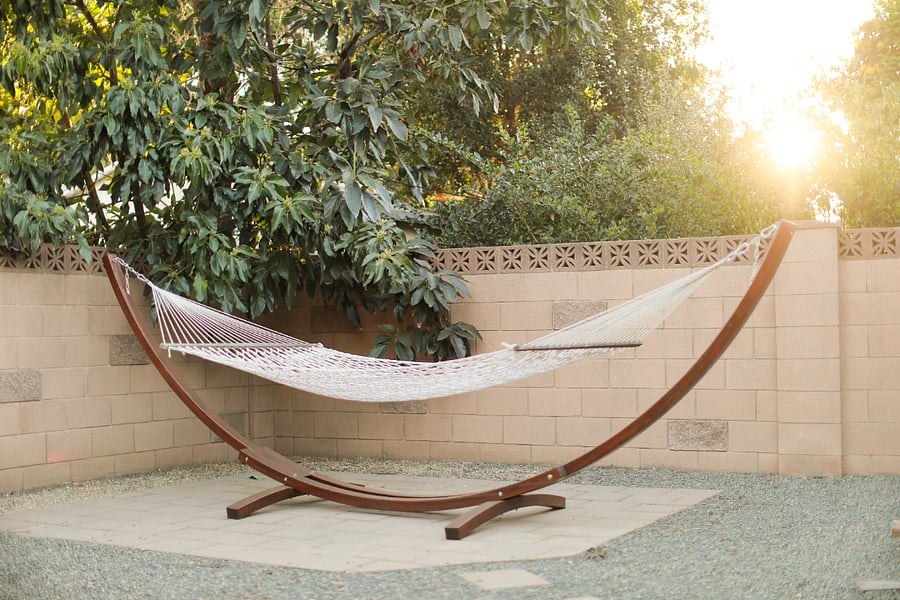 Garden hammock tucked into the landscaping for slow afternoons and golden-hour reading.