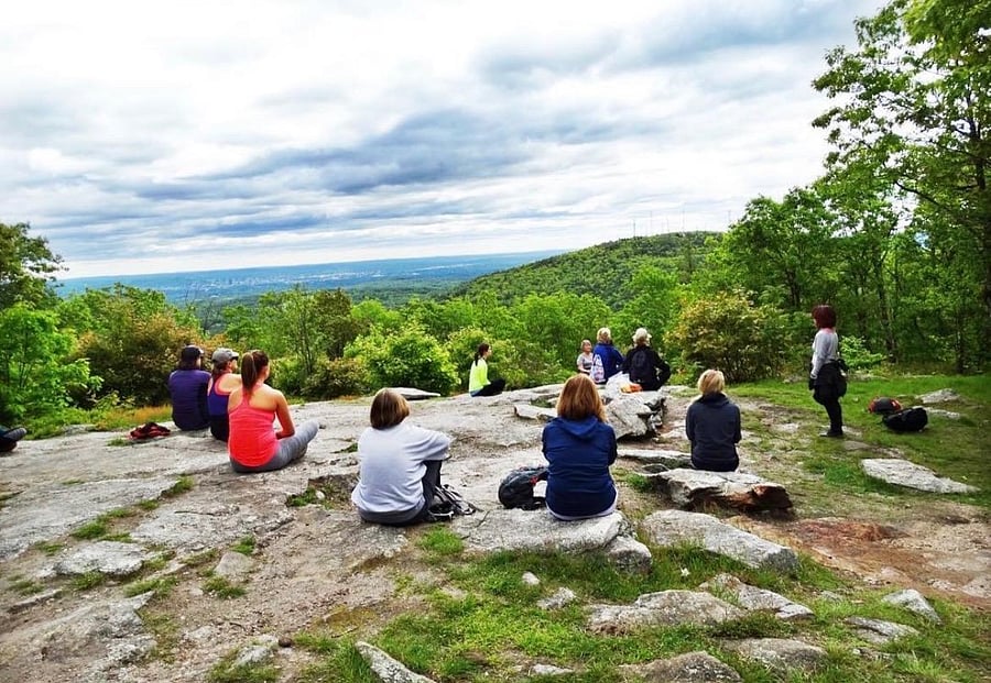 Uncanoonuc Mountains Trails, just a 10-minute drive away, offer a peaceful setting for activities such as hiking, yoga, meditation, and simply relaxing in nature, with scenic views all around.