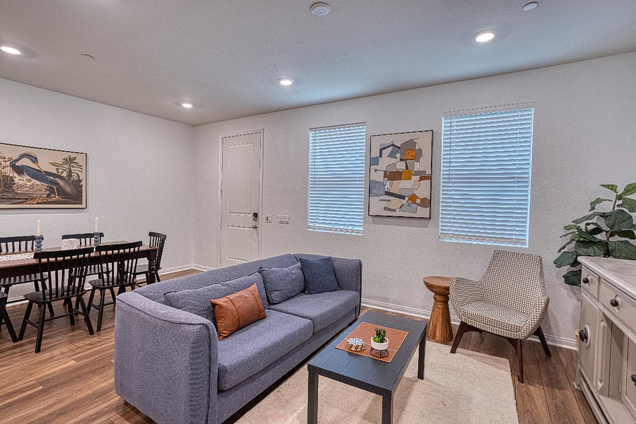 Step into a bright, inviting living space designed for relaxation. With modern furnishings, a dedicated dining area, and plenty of natural light, this open layout is the perfect home base for your Santa Clarita getaway.