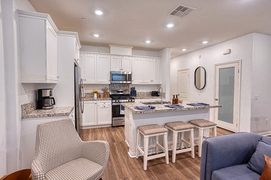 This open-concept layout keeps you connected to the conversation. Brew your morning coffee and enjoy it at the breakfast bar before heading out to the nearby trails. Modern convenience meets effortless style.