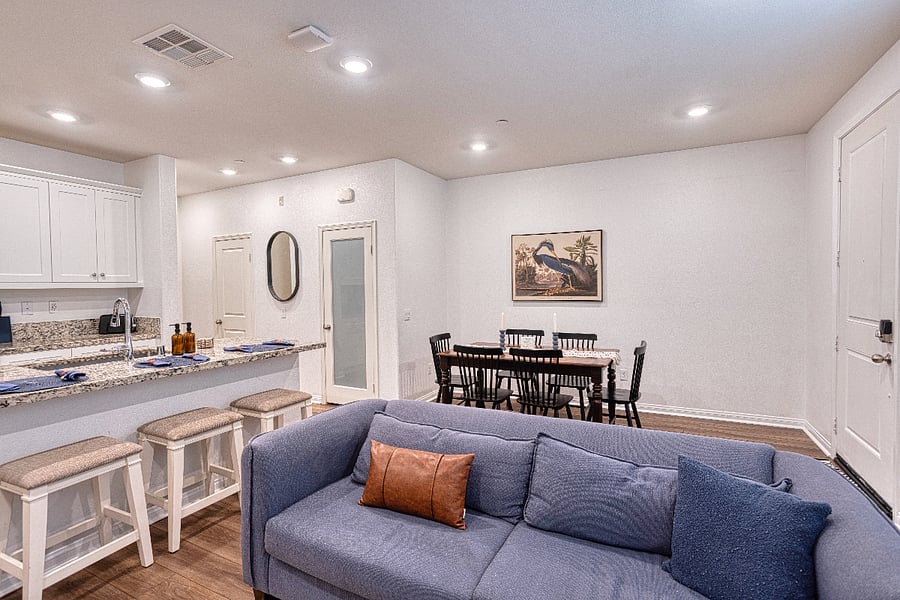 The ideal layout for group stays. Our open-concept main floor seamlessly flows from the comfortable lounge to the dining area and kitchen, ensuring you're always part of the action while relaxing at home.
