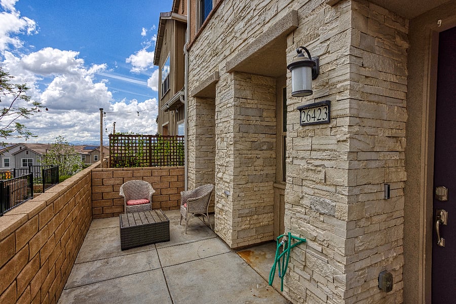 Enjoy the California sunshine on your private patio. This quiet outdoor space is perfect for a morning coffee or an evening breeze, offering a peaceful retreat right outside your front door.
