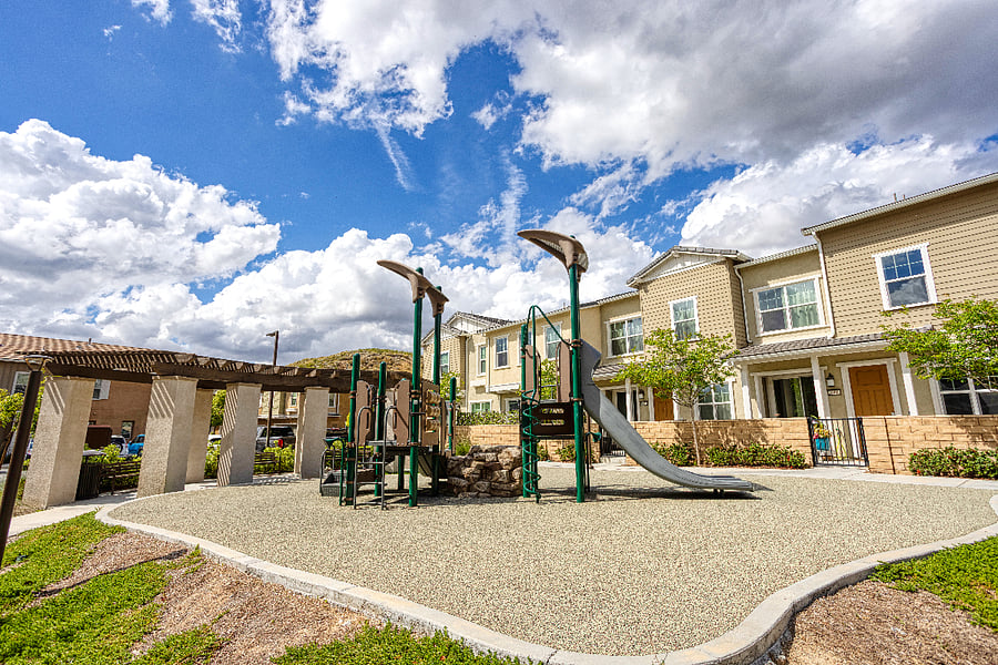 Perfect for families! Our community features a modern playground and park area just steps from the front door. It's a great spot for the kids to burn off some energy while you enjoy the beautiful Santa Clarita sunshine and mountain views.