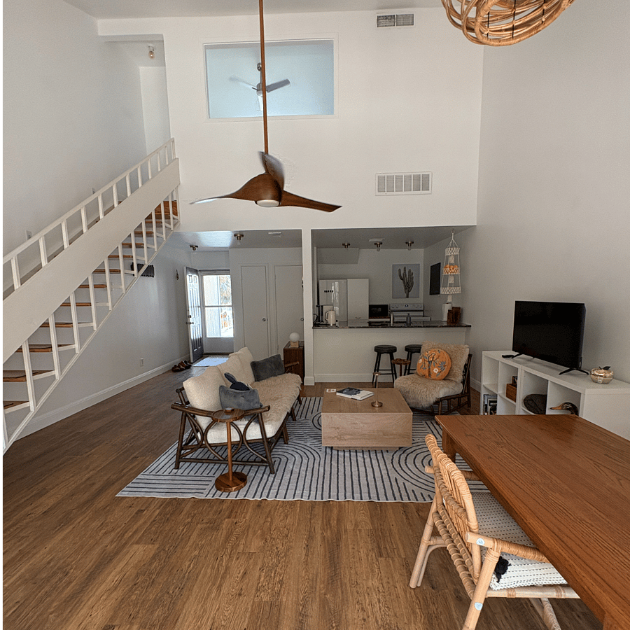 The stairs lead to the bedroom and bathroom.