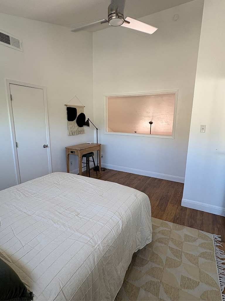 The bedroom is open to main floor (so at-home working generally best suited for solo travellers). This desk top lifts to standing-desk height.