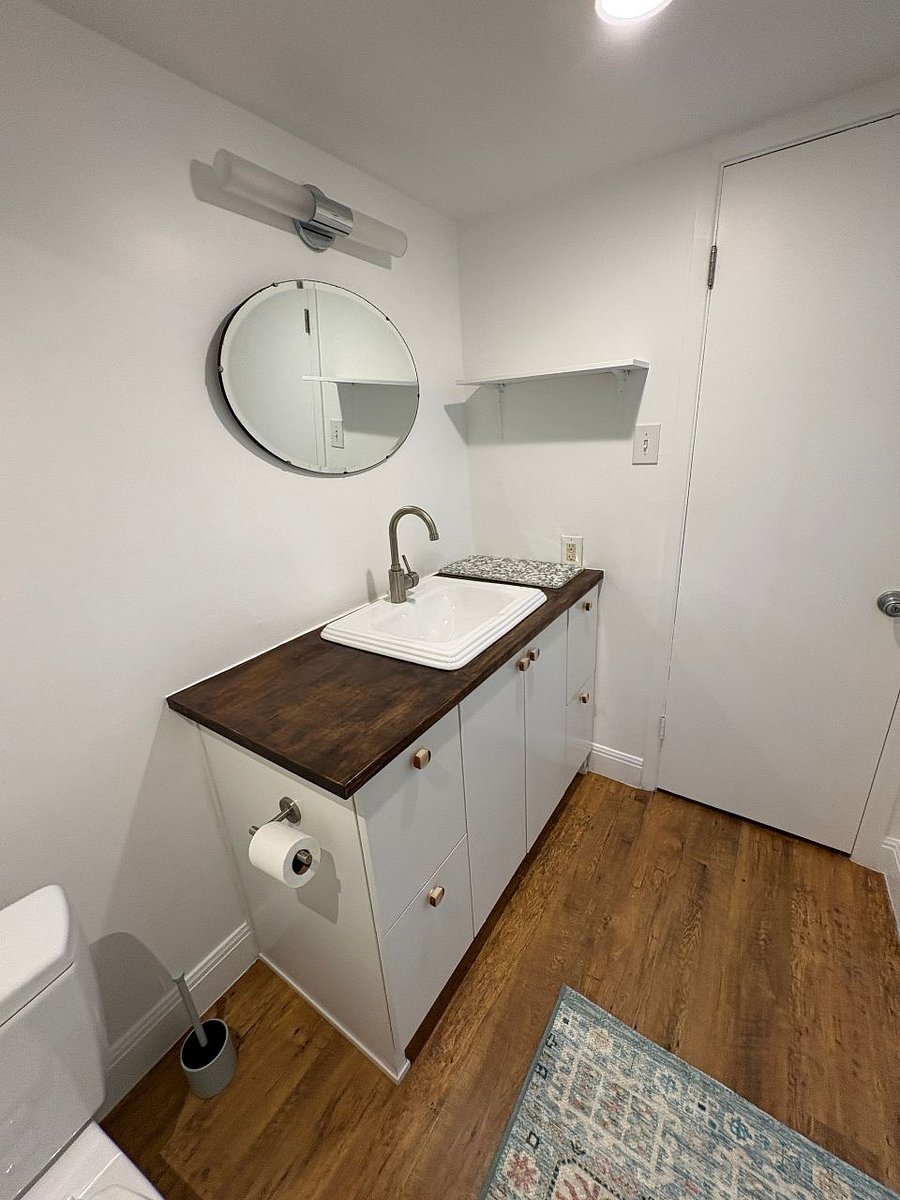Bathroom (the door seen in this photo is to the only closet).
