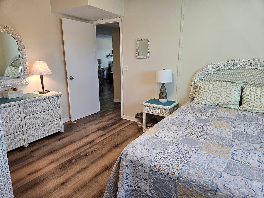 2nd bedroom. Furnished with wicker furniture.