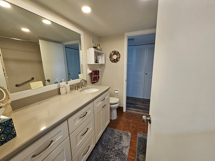 2nd bath has plenty of counter and storage.