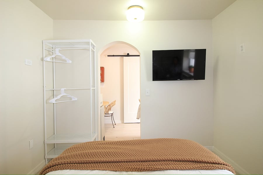 Smart TV and closet. 