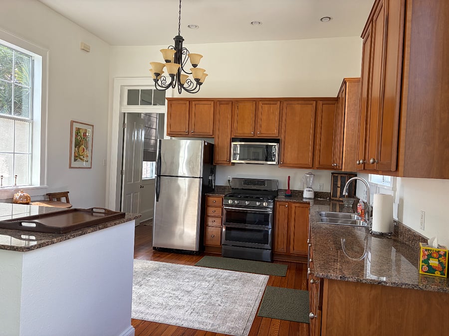 Open kitchen layout opens up to the living room.