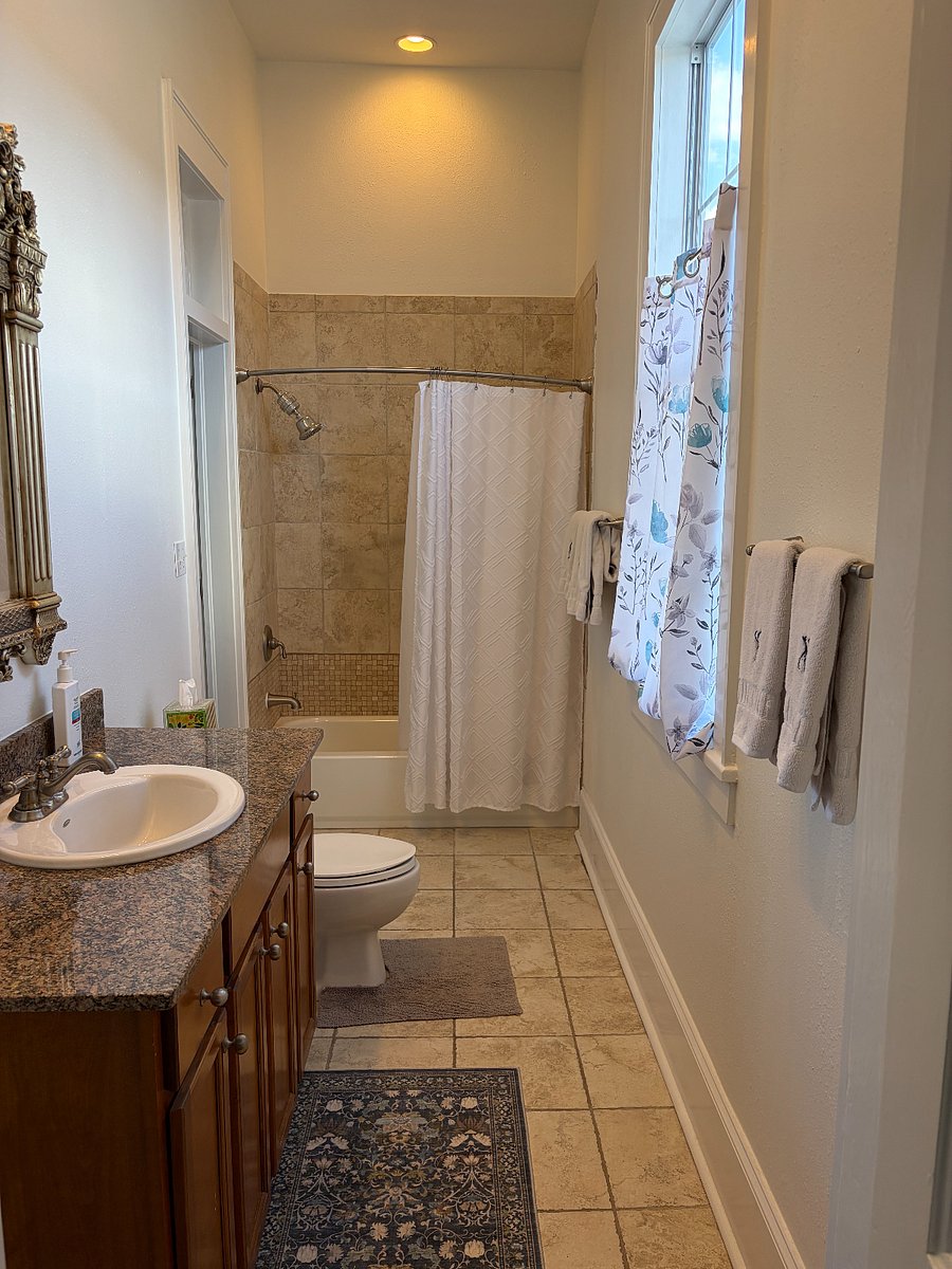 Bathroom connects to both bedrooms