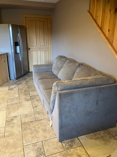 The kitchen is large enough for a living area as well.