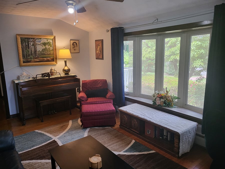 LIVING ROOM: PIANO AND BOW WINDOW