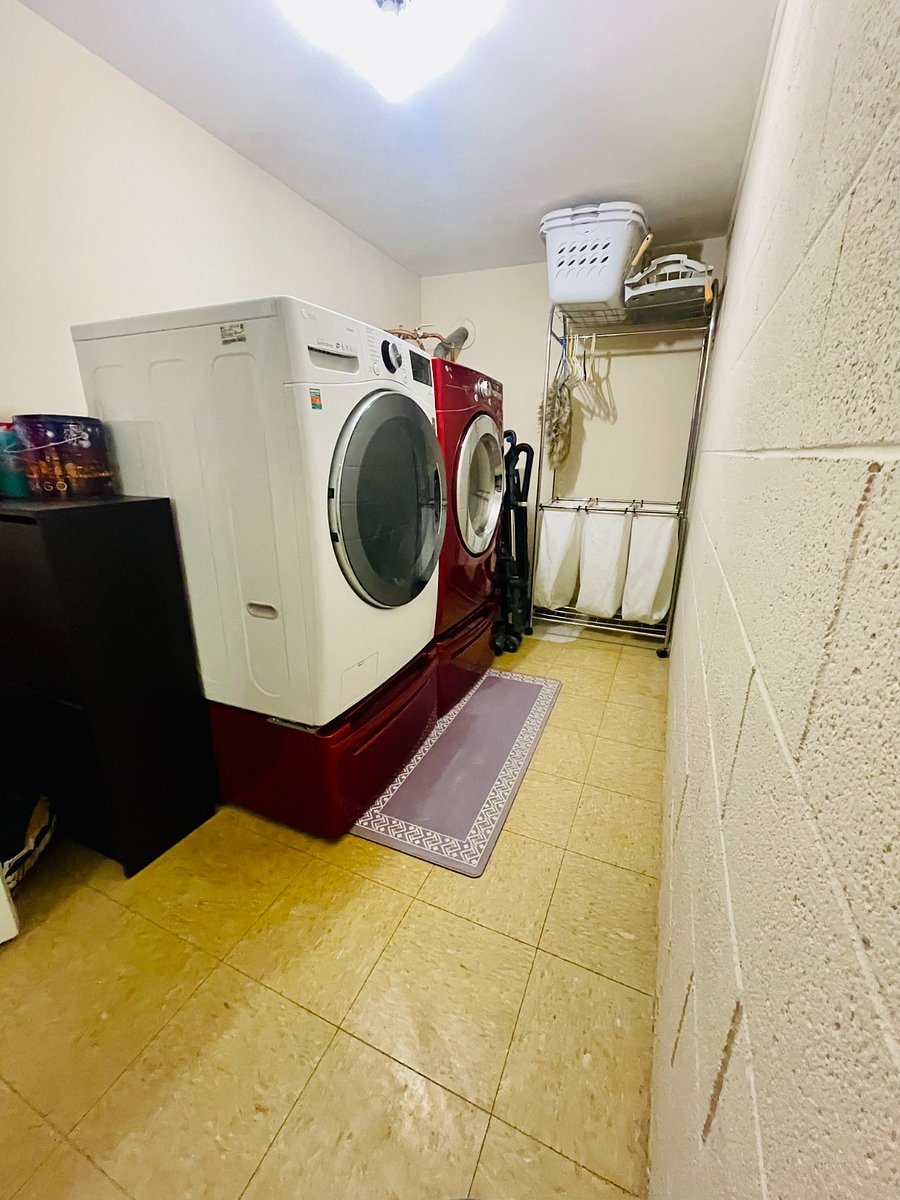 In unit laundry room with LG washer/dryer.