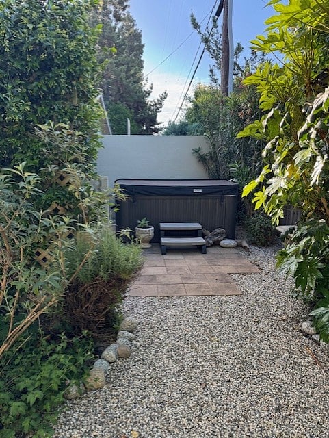 Private hot tub in backyard