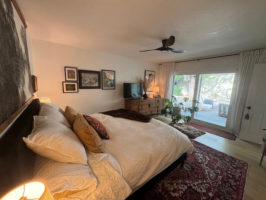 primary suite opens up to private backyard