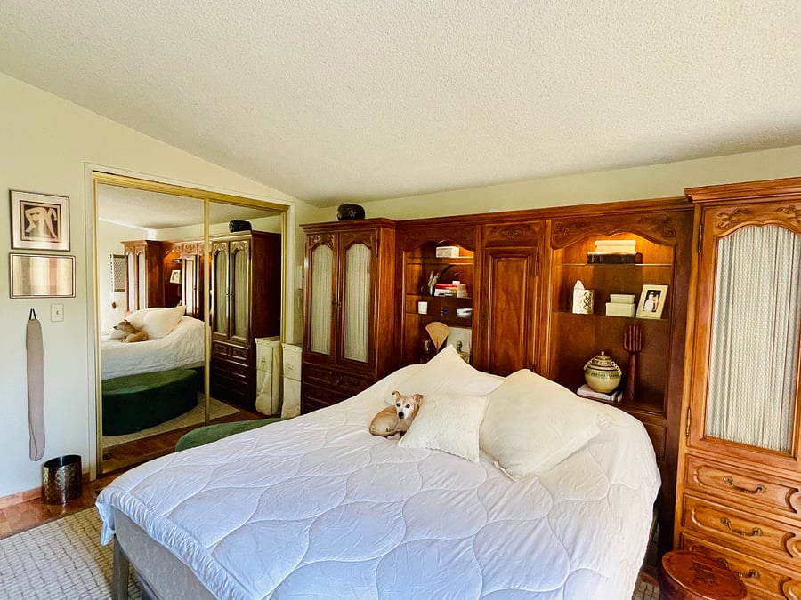 Your bedroom with king-sized bed viewed from the ensuite bathroom.