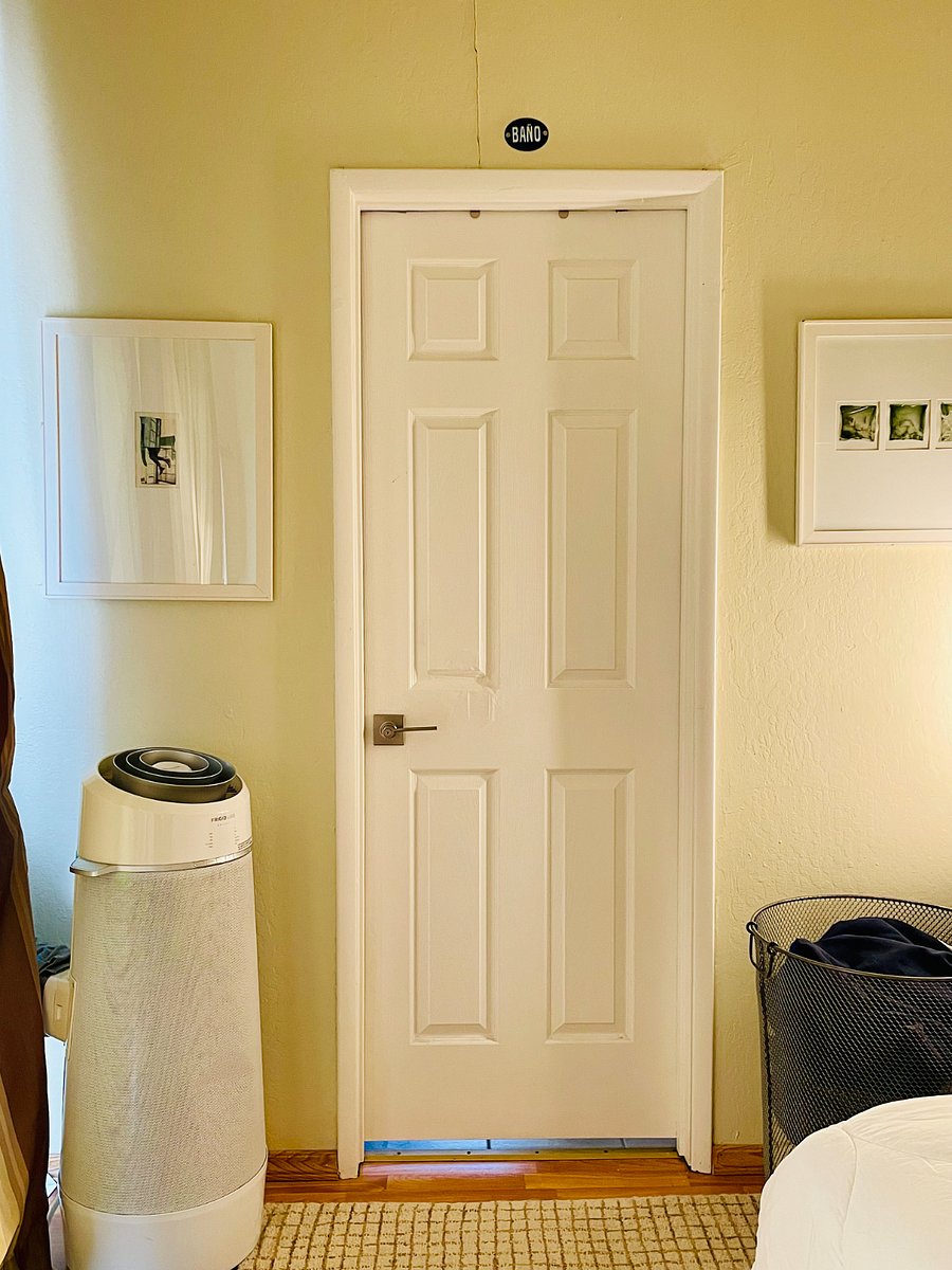 Entrance to your ensuite bathroom and the bedrooms air-conditioning unit.