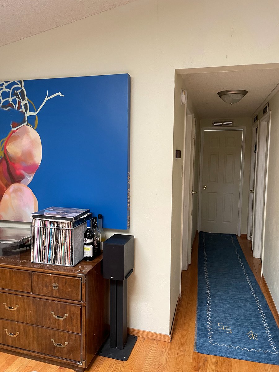 Hallway to the bedrooms off one end of the dining room.