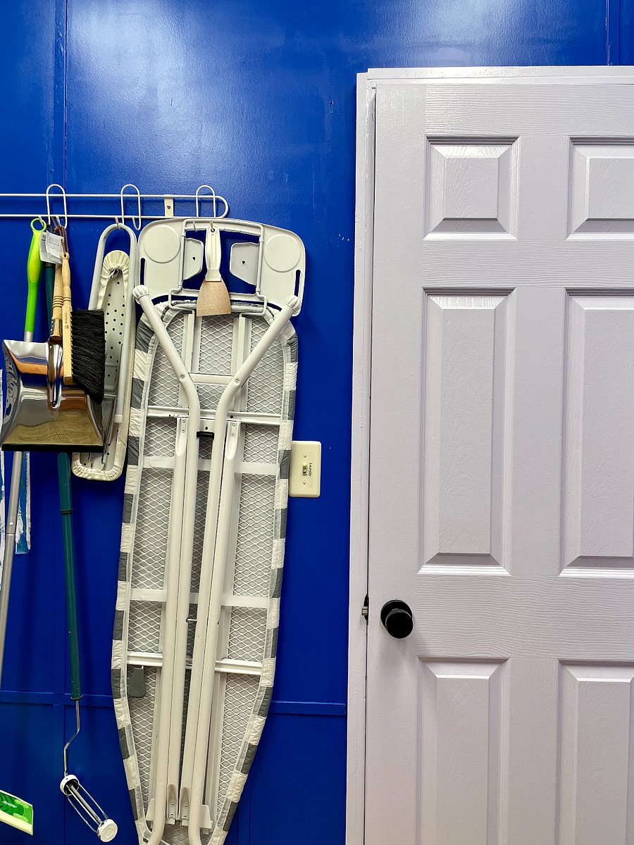 In-house laundry room fully-stocked with laundry and cleaning supplies. Find irons and boards, drying racks, brooms, vacuums, mops and more in our designated room without having to leave the house or go outside.