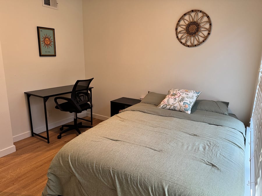 bedroom 3 with full size bed and work space