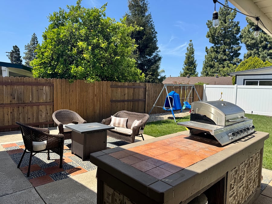private back yard, swing set, fire pit, bbw, outdoor dining. Very quiet peaceful neighborhood