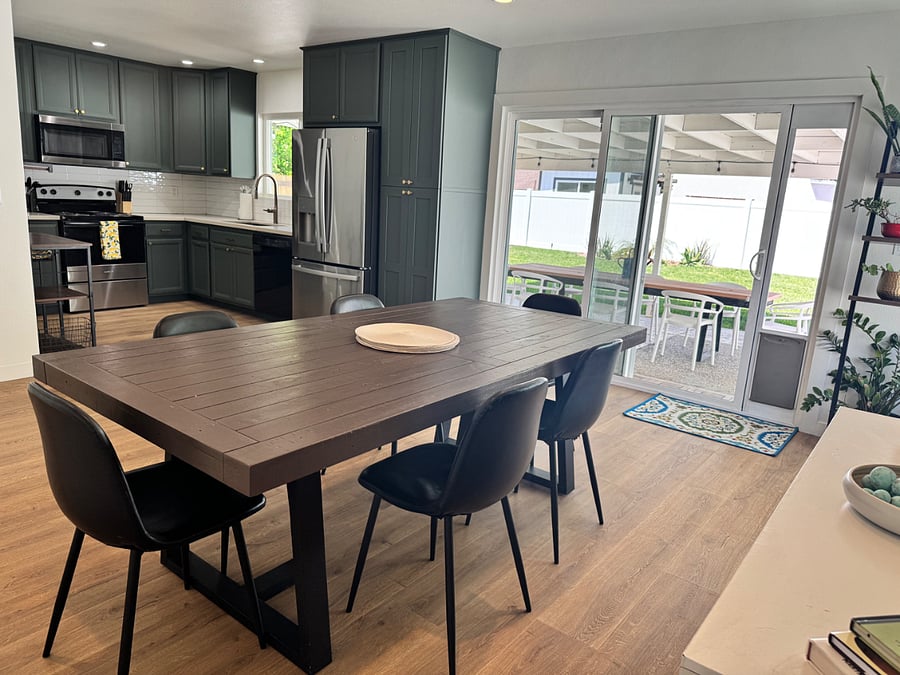 kitchen and dining, with view of backyard and outdoor dining