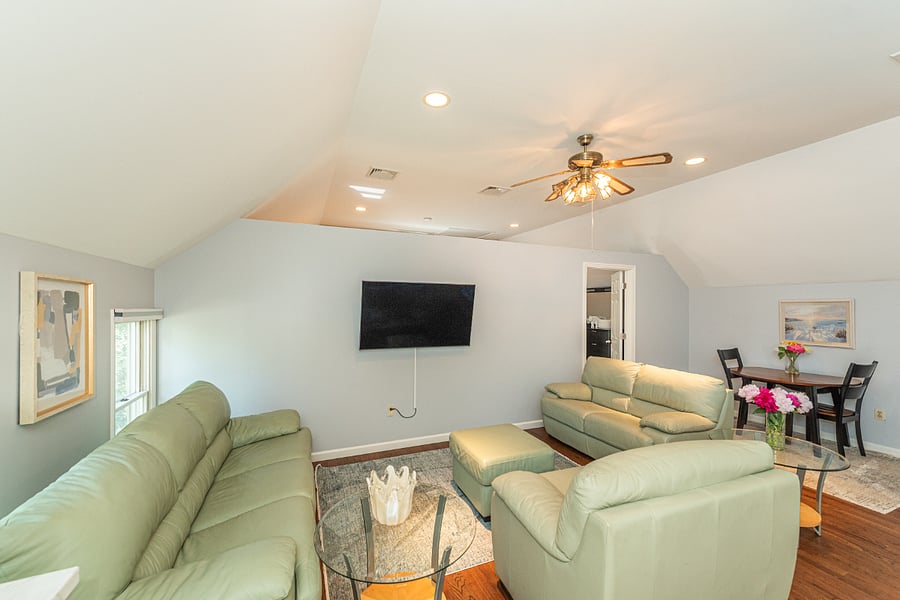 Plenty of space to relax in the living room and watch TV on the 55" Smart TV.