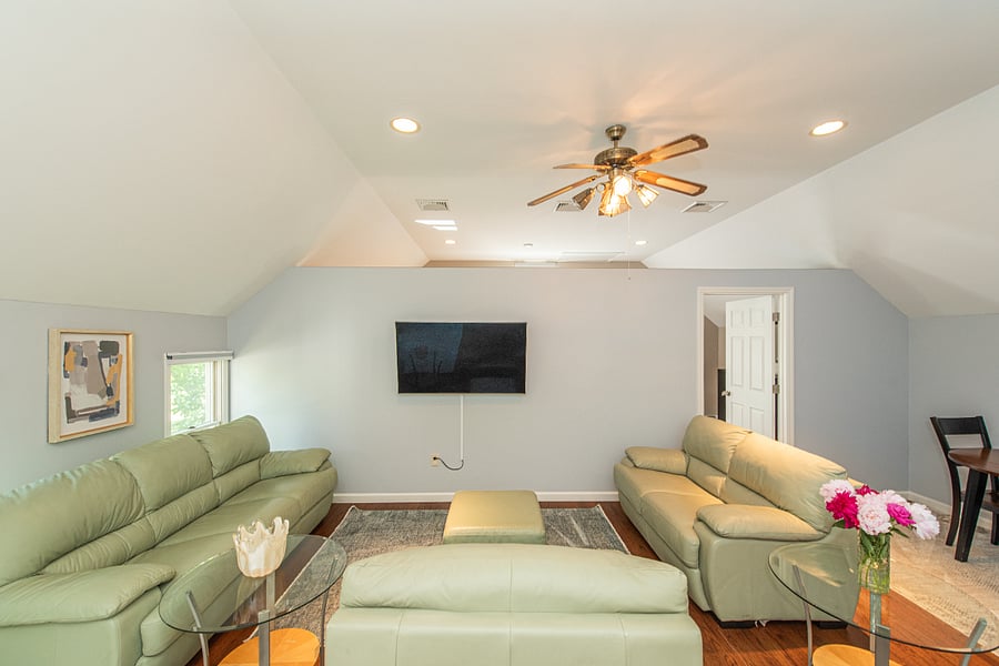 The suite is a nice open floor plan with plenty of natural light. The 3-seater sofa turns into a sofa bed.