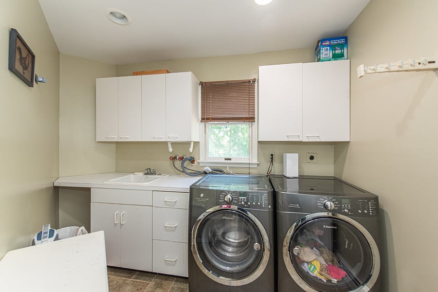 Share laundry space with full size washer & dryer.