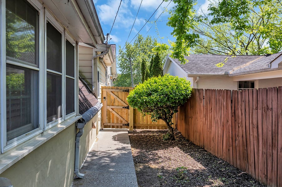 Private walkway to street offers privacy and secured access. 