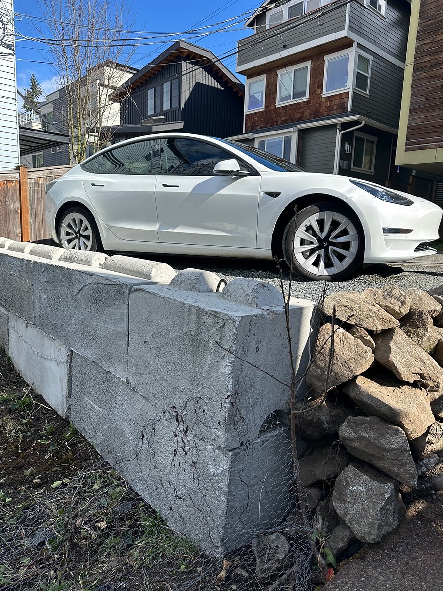 Parking spot in back of house, off of private lane.