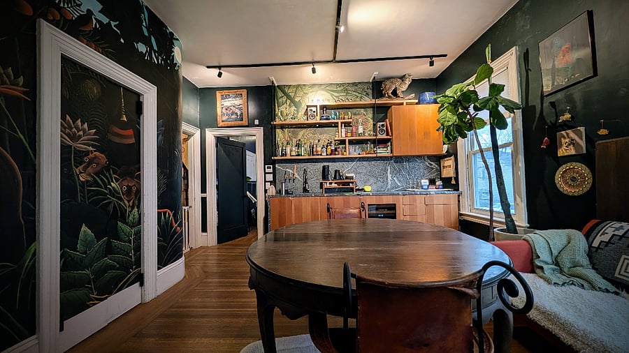 Dining room with custom bar and built-in beverage refrigeration