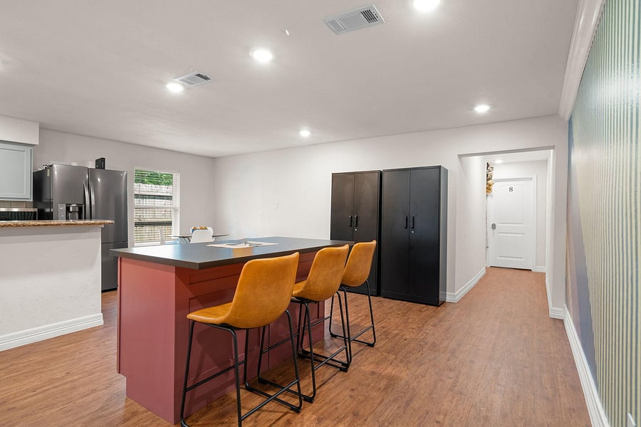 Island for additional storage, seating and gathering.