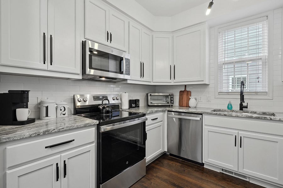 View of the Kitchen Stove, Microwave, Toaster Oven, Dishwasher