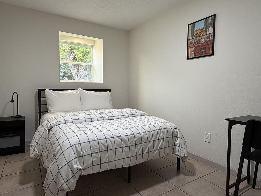 Room 1 - full size bed, desk, chair, nightstand, and lamp