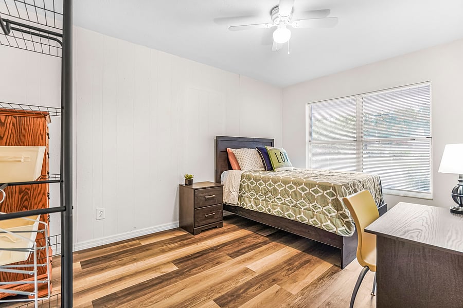 Large spacious bedroom with wide walk space