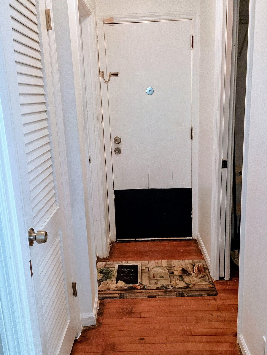 Private entry, exit hallway with patio access. Hall includes a linen closet and large walk-in closet with starter hangers.