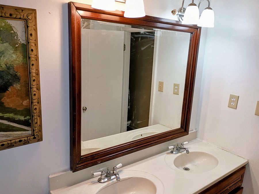 Shared bath large mirror and double vanity