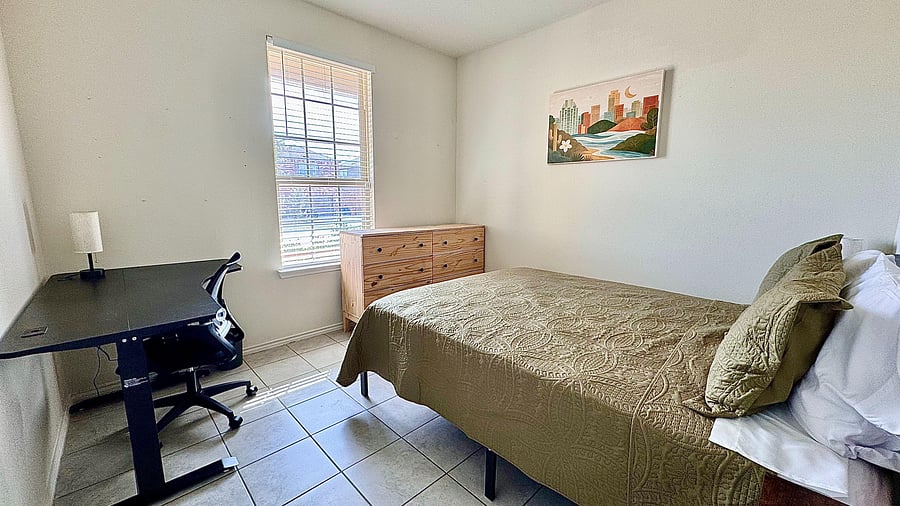 Fully furnished with a premium queen bed, dresser, and modern decor. A quiet, private sanctuary.
